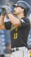 Padres pull away late to top Pirates